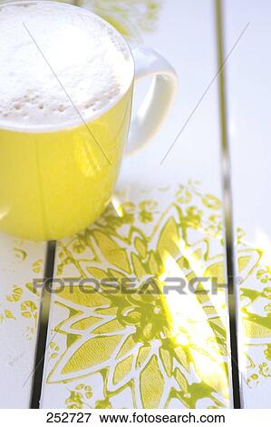 Stock Photo - High angle view of a cup of coffee . Fotosearch