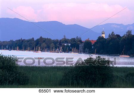 High angle view of a lake with mountains in the background, Starnberger Lake, Bavaria, Germany View Large Photo Image Stock Image - High angle view of a lake with mountains in the background, Starnberger Lake, Bavaria, Germany . Fotosearch