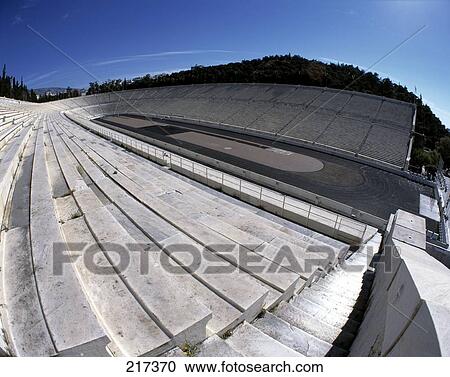 Stock Image - High angle view of empty ancient coliseum, Athens, Greece . Fotosearch