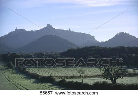 High angle view of fields with mountains in the background View Large Photo Image Stock Photo - High angle view of fields with mountains in the background . Fotosearch