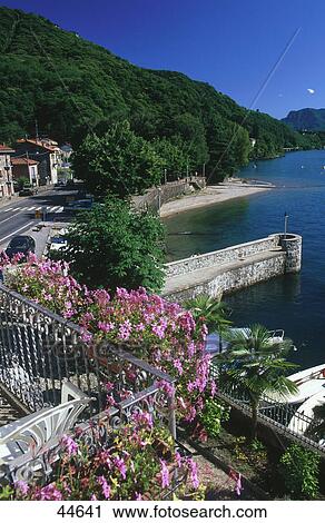 Stock Image - High angle view of flowers at hotel balcony, Hotel Camin Colmegna, Lake Maggiore, Italy . Fotosearch