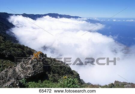 High angle view of fog and mountains, El Hierro, Canary Islands, Spain View Large Photo Image Stock Image - High angle view of fog and mountains, El Hierro, Canary Islands, Spain . Fotosearch