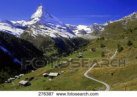 Stock Photo - High angle view of huts on hill, Mt Matterhorn, Valais Canton, Switzerland . Fotosearch