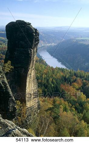 Stock Image - High angle view of river flowing through valley, Elbe River, Mt Teufelsturm, Saxony, Germany . Fotosearch