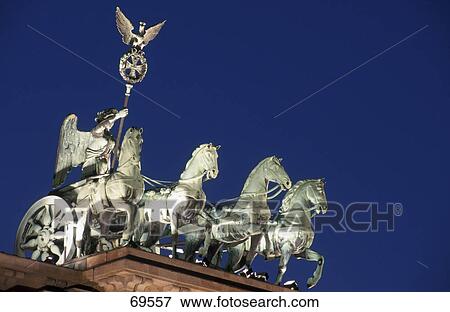 Stock Photo - High section view of statues on gate, Brandenburg Gate, Berlin, Germany . Fotosearch