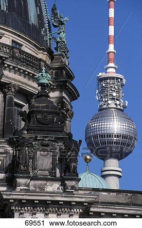 Stock Image - High section view of television tower and cathedral, Berlin Cathedral, Alexanderplatz, Berlin, Germany . Fotosearch