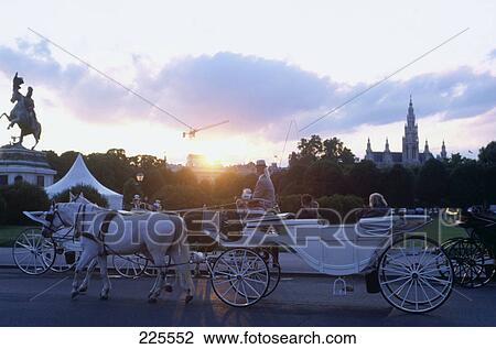 Stock Image - Horsedrawn moving on road, Vienna, Austria . Fotosearch