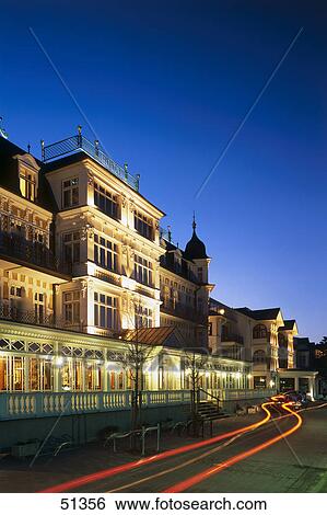 Stock Photograph - Hotel lit up at dusk, Hotel Ahlbecker Hof, Ahlbeck, Usedom Island, Mecklenburg-Western Pomerania, Germany . Fotosearch