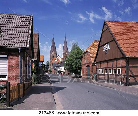 Houses along street, Buecken, Nienburg, Lower Saxony, Germany View Large Photo Image Stock Photograph - Houses along street, Buecken, Nienburg, Lower Saxony, Germany . Fotosearch