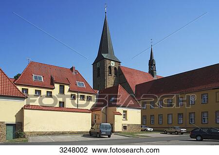Houses and church in Bersenbrueck, Germany View Large Photo Image Stock Image - Houses and church in Bersenbrueck, Germany . Fotosearch