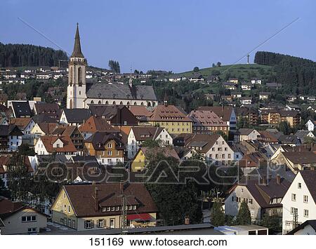 Stock Photo - Houses and church in town, Black Forest, Baden-Württemberg, Germany . Fotosearch