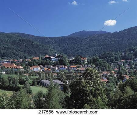 Houses in a village with mountains in the background, Bodenmais, Bavaria, Germany View Large Photo Image Stock Photograph - Houses in a village with mountains in the background, Bodenmais, Bavaria, Germany . Fotosearch