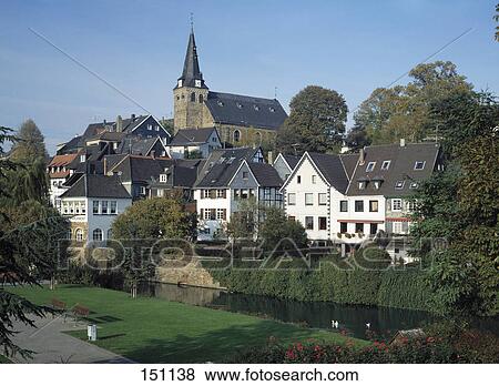 Stock Photo - Houses in town, River Ruhr, Duisburg, North Rhine-Westphalia, Germany . Fotosearch