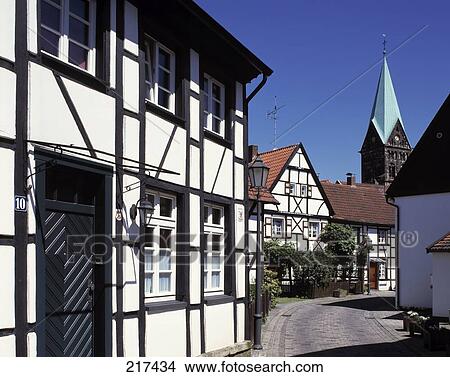 Houses on both sides of road in town, Herten, Germany View Large Photo Image Picture - Houses on both sides of road in town, Herten, Germany . Fotosearch