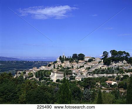 Stock Image - Houses on hill, Saignon, Vaucluse, Luberon, France . Fotosearch