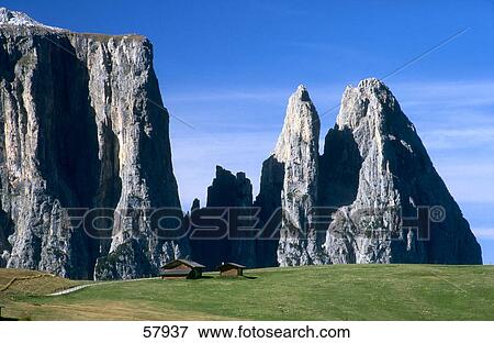 Stock Photo - Huts on landscape, Seiser Alm, Dolomites, Italy . Fotosearch