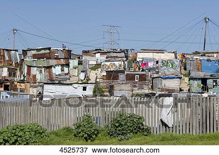 Informal settlement along N2 highway on the outskirts of Cape Town, South Africa View Large Photo Image Stock Photo - Informal settlement along N2 highway on the outskirts of Cape Town, South Africa . Fotosearch