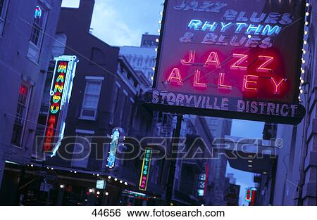 Stock Photograph - Jazz Alley written in neon lights, French Quarter, Bourbon Street, New Orleans, Louisiana, USA . Fotosearch