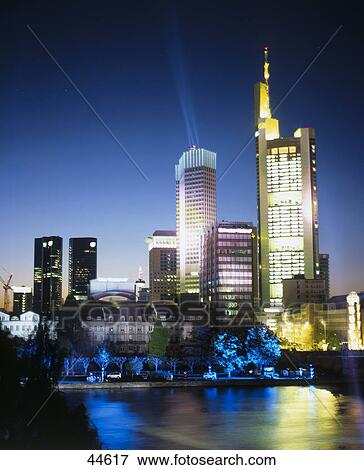 Stock Photo - Laser show over river, Main River, European Central Bank, Frankfurt, Germany . Fotosearch