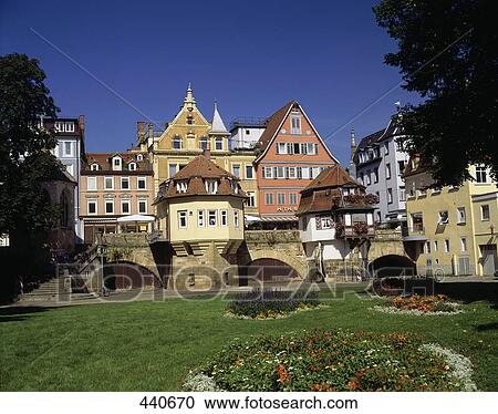 Stock Image - Lawn in front of buildings in town, Baden-Wurttemberg, Germany . Fotosearch