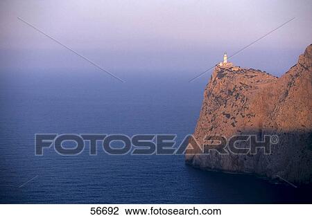 Lighthouse on the edge of a cliff View Large Photo Image Stock Image - Lighthouse on the edge of a cliff . Fotosearch