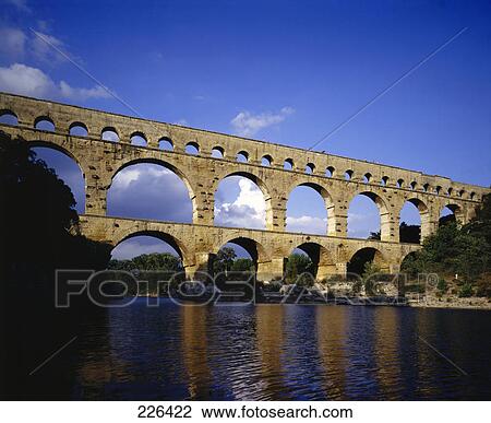 Low angle view of bridge, Pont du Gard Bridge, Roussillon, Languedoc, France View Large Photo Image Stock Image - Low angle view of bridge, Pont du Gard Bridge, Roussillon, Languedoc, France . Fotosearch
