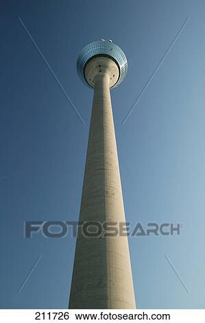 Stock Photograph - Low angle view of communication tower, Rhein Tower, Dusseldorf, Nordrhein-Westfalen, Germany . Fotosearch