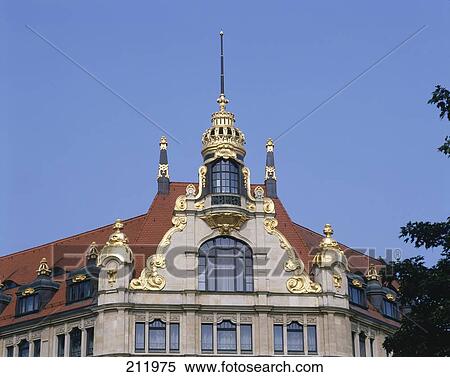 Stock Photography - Low angle view of gilded gable of building, Leipzig, Saxony, Germany . Fotosearch