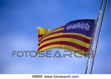 Low angle view of Majorcan flag, Majorca, Spain, Europe View Large Photo Image Stock Photograph - Low angle view of Majorcan flag, Majorca, Spain, Europe . Fotosearch