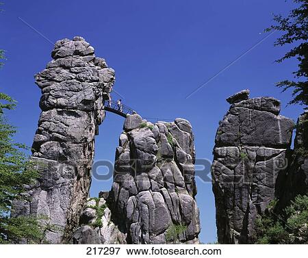 Low angle view of rock formations, Teutoburg Forest, Horn-Bad Meinberg, Lippe, North Rhine Westphalia, Germany View Large Photo Image Stock Photo - Low angle view of rock formations, Teutoburg Forest, Horn-Bad Meinberg, Lippe, North Rhine Westphalia, Germany . Fotosearch