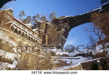 Low angle view of snow-covered hotel View Large Photo Image Stock Photo - Low angle view of snow-covered hotel . Fotosearch