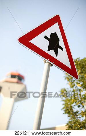 Stock Image - Low angle view of traffic sign . Fotosearch