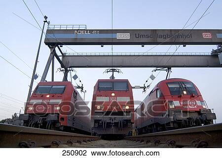 Stock Image - Low angle view of trains on track, Billwerder, Hamburg, Germany . Fotosearch