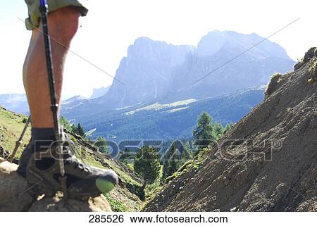 Low section view of hiker standing on mountain View Large Photo Image Stock Photograph - Low section view of hiker standing on mountain . Fotosearch