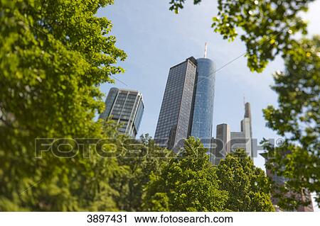 Stock Image - Main Tower behind trees, Frankfurt am Main, Germany . Fotosearch