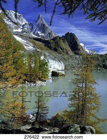 Mountains reflected in the lake water, Mont Blanc, Val Veny, Piemonte, Italy View Large Photo Image Stock Image - Mountains reflected in the lake water, Mont Blanc, Val Veny, Piemonte, Italy . Fotosearch