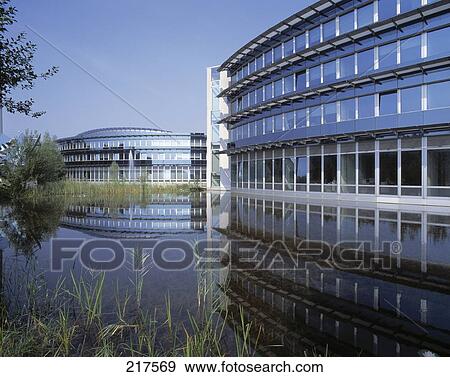 Stock Photo - Office buildings at waterfront, Ruhr, North Rhine Westphalia, Germany . Fotosearch
