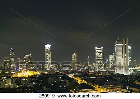 Stock Photo - Office buildings lit up at night, Dresdner Bank, DeKaBank, Frankfurt, Hesse, Germany . Fotosearch
