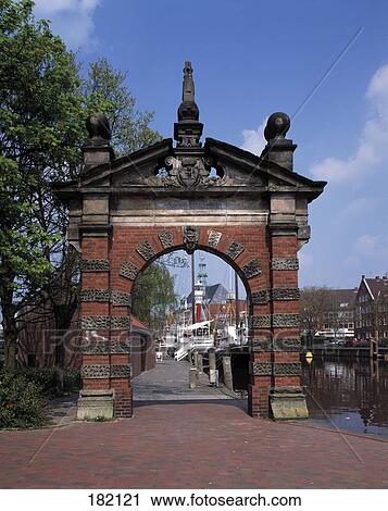 Old archway at harbor in town, East Frisia, Lower Saxony, Germany View Large Photo Image Stock Image - Old archway at harbor in town, East Frisia, Lower Saxony, Germany . Fotosearch