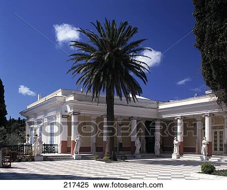 Stock Photography - Palm tree in courtyard of palace, Achillion Palace, Corfu, Greece . Fotosearch