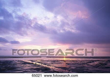 Stock Image - Panoramic view of sea at dusk, Germany . Fotosearch
