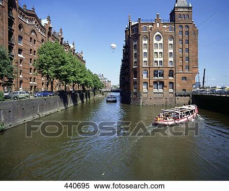 Stock Photography - Passenger boat in canal, Hamburg, Germany . Fotosearch
