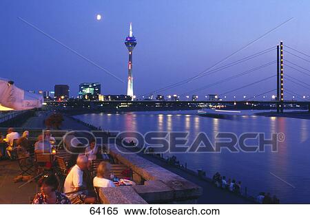 People at sidewalk cafe in front of art museum, Duesseldorf, North Rhine-Westphalia, Germany View Large Photo Image Stock Photography - People at sidewalk cafe in front of art museum, Duesseldorf, North Rhine-Westphalia, Germany . Fotosearch