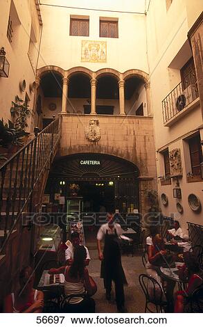 Stock Photo - People in coffee house, Palma, Majorca, Balearic Islands, Spain . Fotosearch