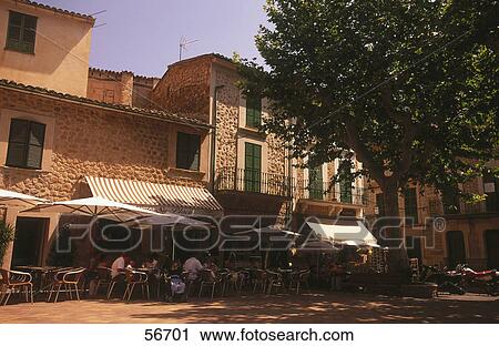 People sitting at outdoor cafe, Fornalutx, Majorca, Balearic Islands, Spain View Large Photo Image Stock Image - People sitting at outdoor cafe, Fornalutx, Majorca, Balearic Islands, Spain . Fotosearch