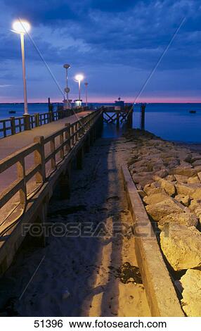 Stock Photograph - Pier leading to sea, Germany . Fotosearch