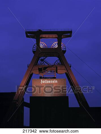 Pulley crane against blue sky at dusk, Germany View Large Photo Image Stock Image - Pulley crane against blue sky at dusk, Germany . Fotosearch