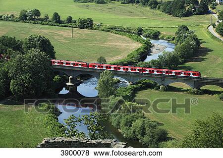 Stock Photo - Railway over Railway bridge, Nature reserve Bergisches Land, North Rhine-Westphalia, Germany, Europe . Fotosearch