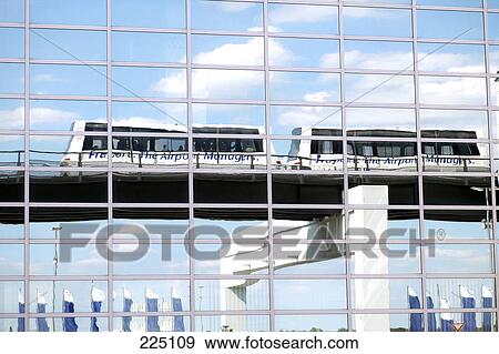 Stock Photo - Reflection of bridge on window glass, Frankfurt, Germany . Fotosearch