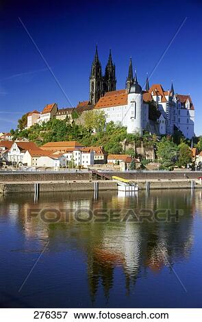 Stock Photo - Reflection of castle and church in water, Albrechtsburg Castle, Meissen Cathedral, Elbe River, Saxony, Germany . Fotosearch